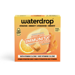 Pomarańczowo-żółte opakowanie kostek Immunity Waterdrop z grafiką cytrusa.